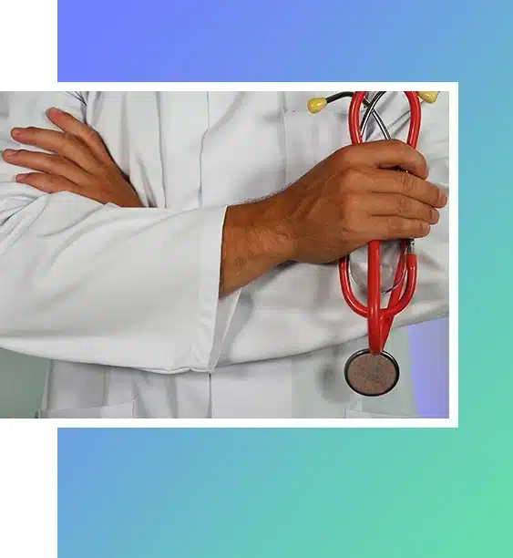 Doctor holding red stethoscope.